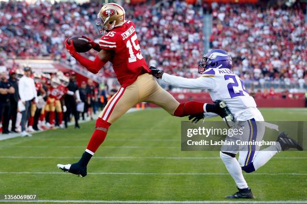 Jauan Jennings of the San Francisco 49ers makes a touchdown reception against Mackensie Alexander of the Minnesota Vikings in the second quarter at...