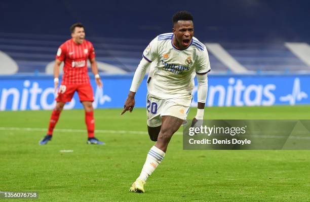 Vinicius Junior of Real Madrid celebrates after scoring their side's second goal during the La Liga Santander match between Real Madrid CF and...