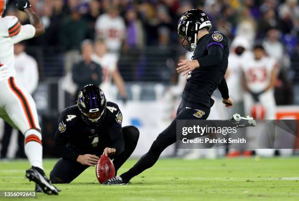 Justin Tucker of the Baltimore Ravens kicks a field goal during a game against the Cleveland Browns at M&T Bank Stadium on November 28, 2021 in...