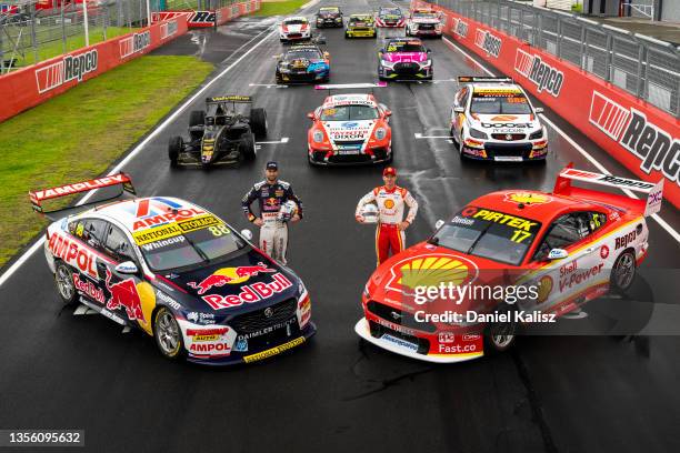 Shane van Gisbergen drives the Red Bull Ampol Holden Commodore ZB and Will Davison drives the Shell V-Power Ford Mustang pose with their cars during...