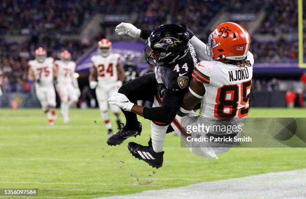 David Njoku of the Cleveland Browns misses a pass defended by Marlon Humphrey of the Baltimore Ravens in the second quarter during a game at M&T Bank...