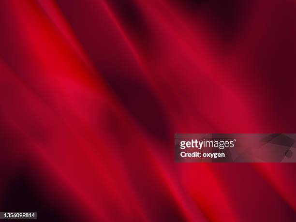 red satin abstract ribbon background. celebration anniversary valentine abstract background. soft flowing wave dark curve background - rouge photos et images de collection