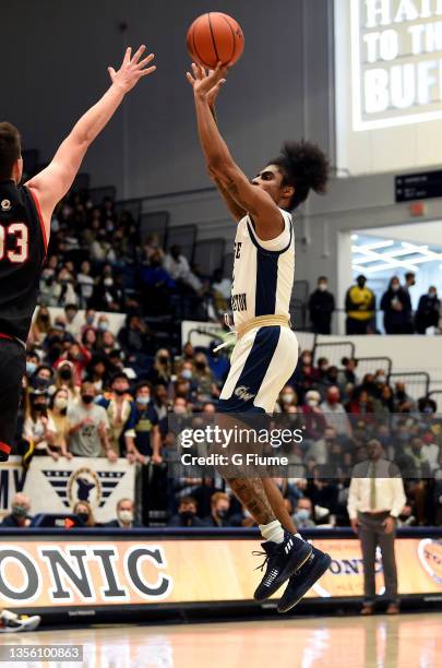 James Bishop of the George Washington Colonials shoots the ball against the St. Francis Red Flash at Charles E. Smith Athletic Center on November 09,...