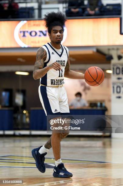 James Bishop of the George Washington Colonials handles the ball against the St. Francis Red Flash at Charles E. Smith Athletic Center on November...