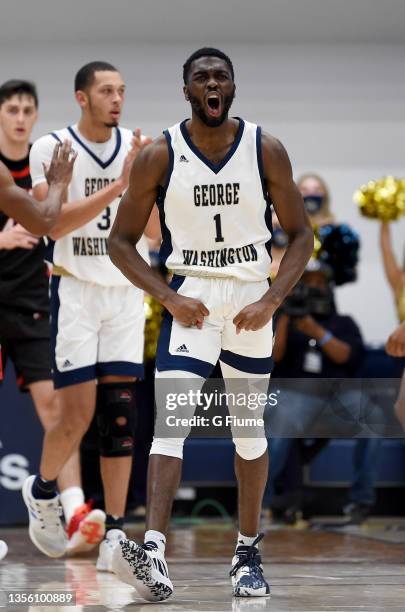 Joe Bamisile of the George Washington Colonials celebrates during the game against the St. Francis Red Flash at Charles E. Smith Athletic Center on...