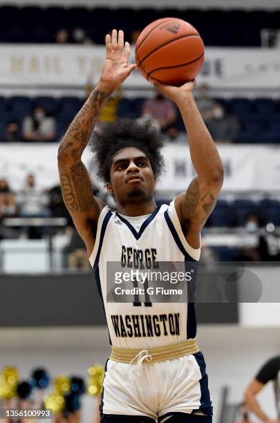 James Bishop of the George Washington Colonials shoots a free throw against the St. Francis Red Flash at Charles E. Smith Athletic Center on November...