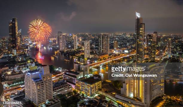 loy kratong fireworks - bangkok river stock pictures, royalty-free photos & images