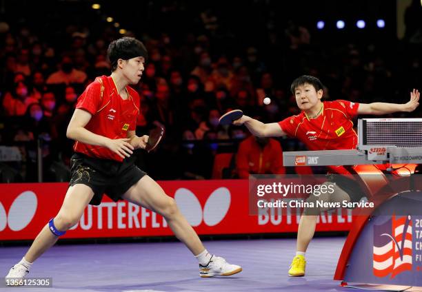 Wang Chuqin and Sun Yingsha of China compete in the Mixed Doubles final match against Tomokazu Harimoto and Hina Hayata of Japan on day six of the...