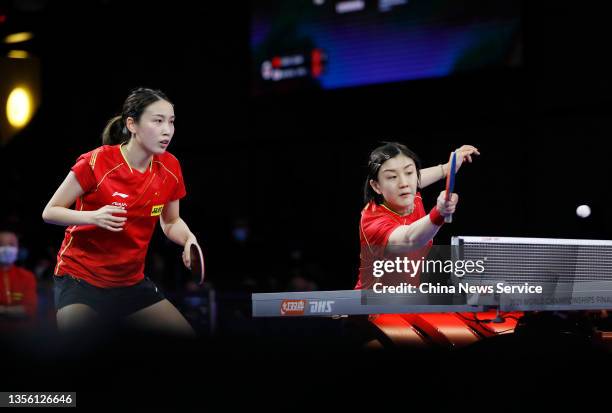 Chen Meng and Qian Tianyi of China compete in the Women's Doubles semi-final match against Mima Ito and Hina Hayata of Japan on day six of the 2021...