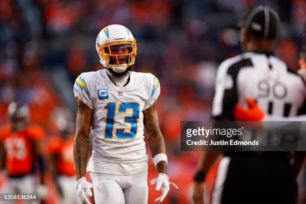 Wide receiver Keenan Allen of the Los Angeles Chargers argues a non-call with a referee during the second half against the Denver Broncos at Empower...