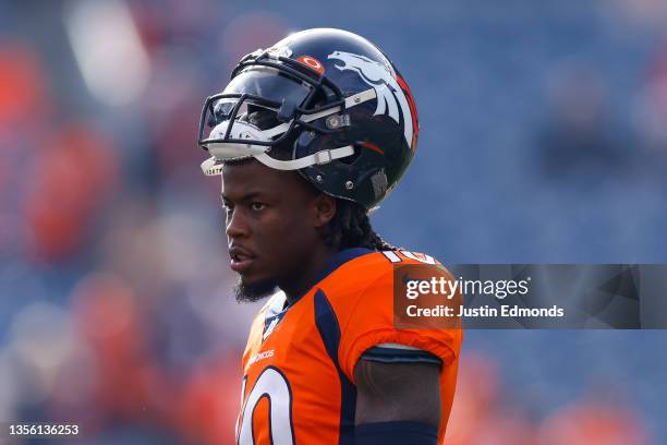 Wide receiver Jerry Jeudy of the Denver Broncos walks on the field before a game against the Los Angeles Chargers at Empower Field at Mile High on...