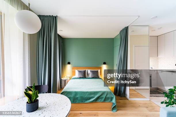 tiny, one-room apartment - small apartment building exterior stock pictures, royalty-free photos & images