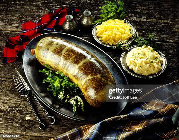 haggis with neeps & mashed potato - burning stock pictures, royalty-free photos & images