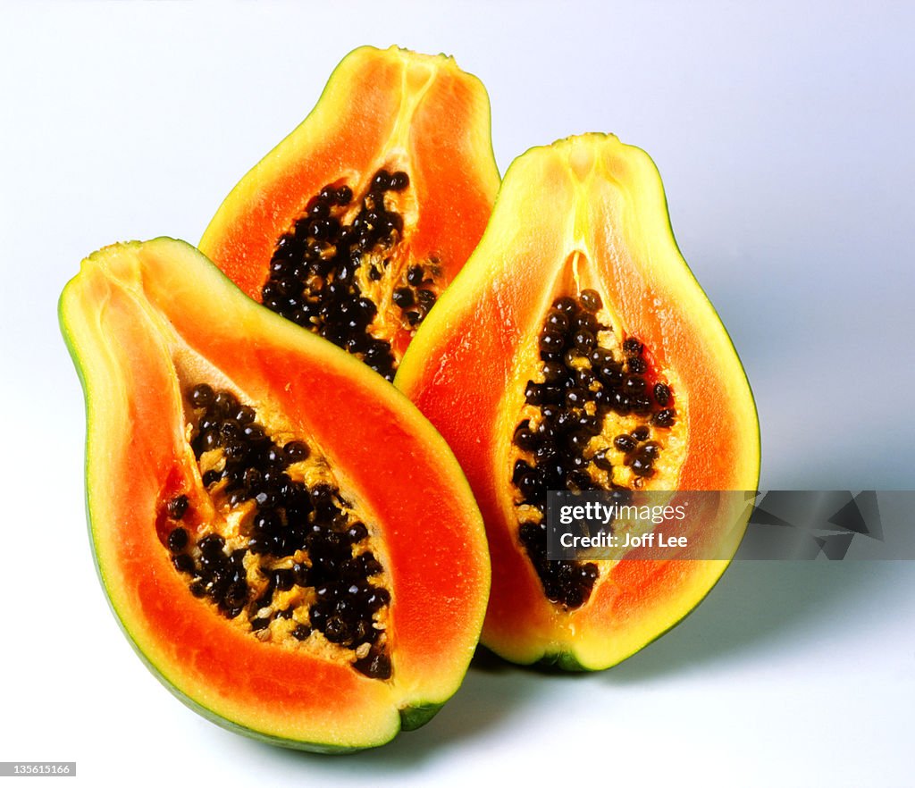 Halved papayas