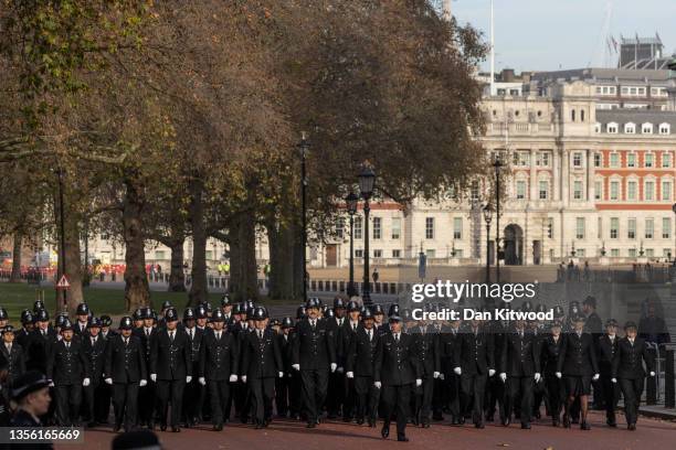 Police officers process down Horse Guards Parade ahead of a special memorial service for Met Police Sergeant Matiu "Matt" Ratana on November 29, 2021...