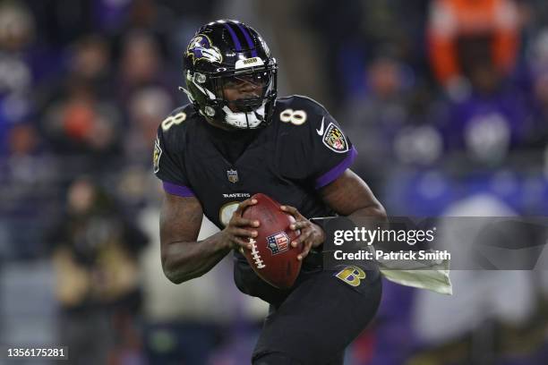 Quarterback Lamar Jackson of the Baltimore Ravens looks to pass the ball against the Cleveland Browns at M&T Bank Stadium on November 28, 2021 in...