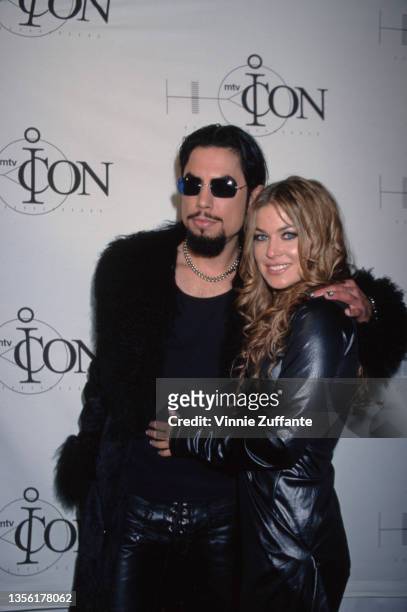American guitarist, singer, and songwriter Dave Navarro and American actress and model Carmen Electra attend an 'MTV Icon' ceremony, held at Sony...