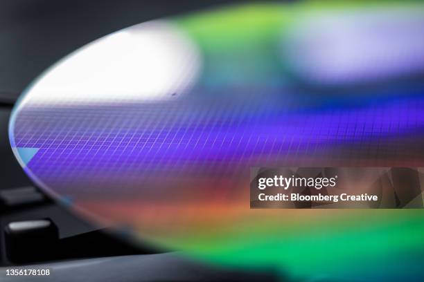 a silicon wafer - computer wafer stock pictures, royalty-free photos & images