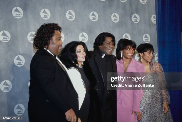 American civil rights activist and Baptist minister Reverend Al Sharpton with Adrienne Rodriguez , American singer and musician James Brown , and...