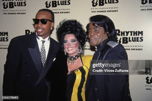 American rapper MC Hammer, James Brown's wife Adrienne Rodriguez , and American singer and musician James Brown attend Rhythm & Blues Foundation...