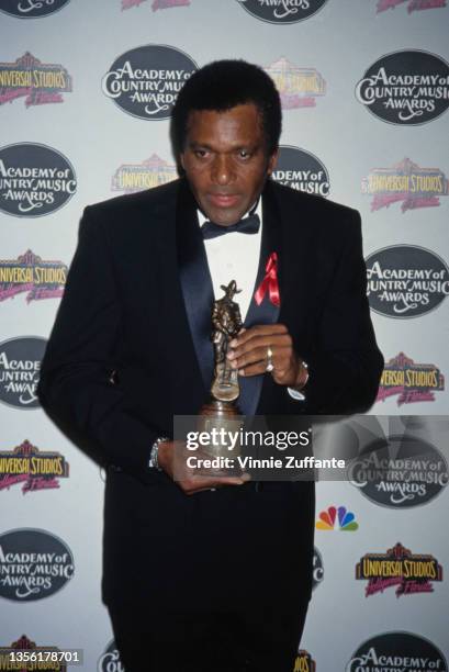 American singer and guitarist Charley Pride in the press room of the 29th Annual Academy of Country Music Awards, held at the Universal Amphitheatre...