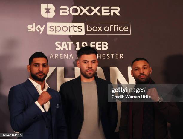 Amir Khan and Kell Brook pose for a photo with promoter, Ben Shalom as they announce an upcoming fight during a BOXXER Press Conference at Hilton...