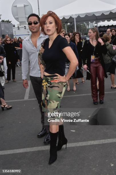 American-Canadian actress Jennifer Tilly, wearing a black v-neck t-shirt with a camouflage skirt, attends the 16th Independent Spirit Awards, held at...