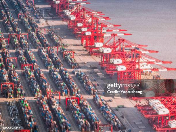 container ship docked in port ,aerial view from above - attraccato foto e immagini stock