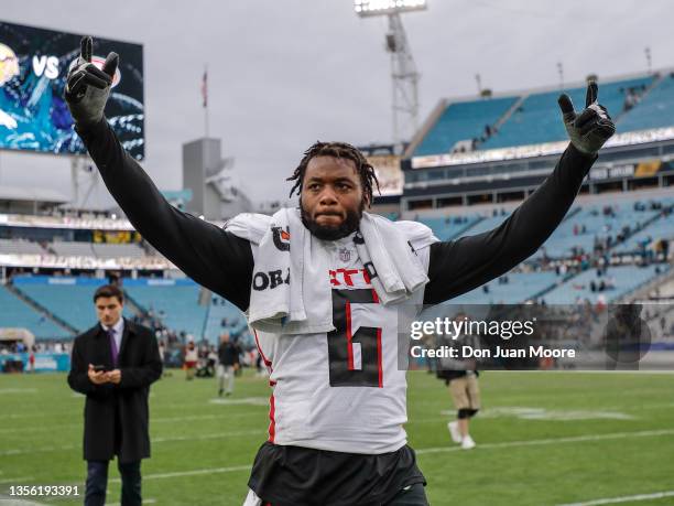 Linebacker Dante Fowler, Jr. #6 of the Atlanta Falcons raise his arms up to the fans after the game against the Jacksonville Jaguars at TIAA Bank...