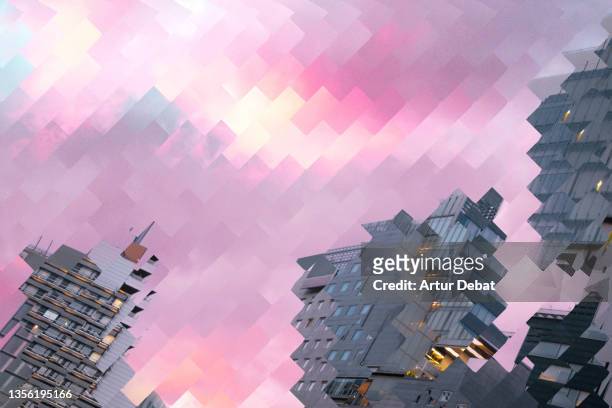 urban skyline with mosaic distortion creating surreal effect. - broken mirror stock-fotos und bilder