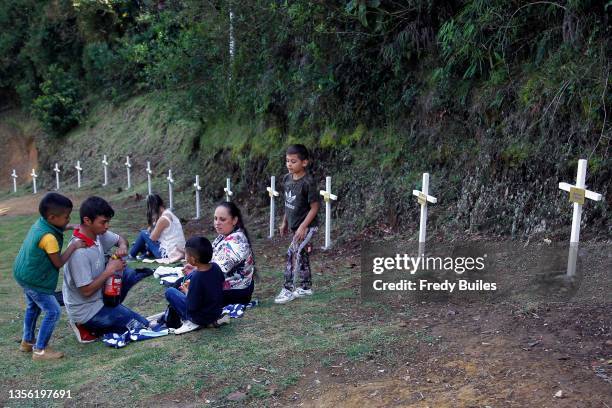 Family eats on a trail at Cerro Chapeco, the place where Lamia Flight 2933 crashed on the 5th anniversary of Chapecoense team plane crash on November...