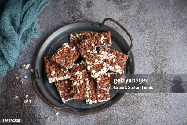 chocolate with puffed rice. - rice cakes stock pictures, royalty-free photos & images