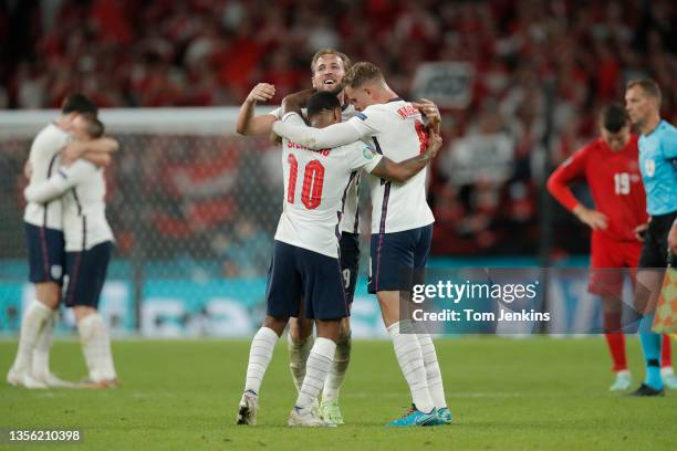 Raheem Sterling, Harry Kane and Jordan Henderson celebrate the England victory on the final whistle during the England v Denmark Euro 2020 semi-final...