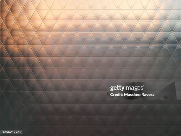 sunset behind glass - frosted glass stockfoto's en -beelden