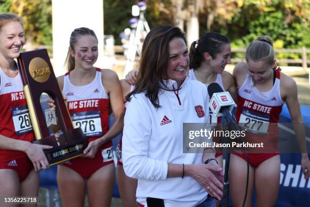 Head coach Laurie Henes of the NC State Wolfpack talks to the media after winning the Division II Women's Cross Country Championship held at...
