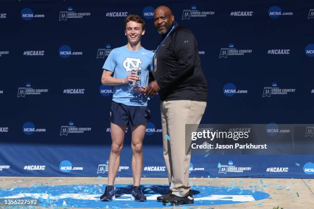 Will Coogan of the North Carolina Tar Heels accepts the Elite 90 award after the Division II Men's and Women's Cross Country Championship held at...