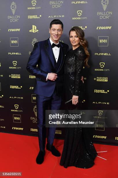 Robert Lewandowski of Poland and Bayern Munich and his wife Anna Lewandowska attend the Ballon D'Or photocall at Theatre du Chatelet on November 29,...