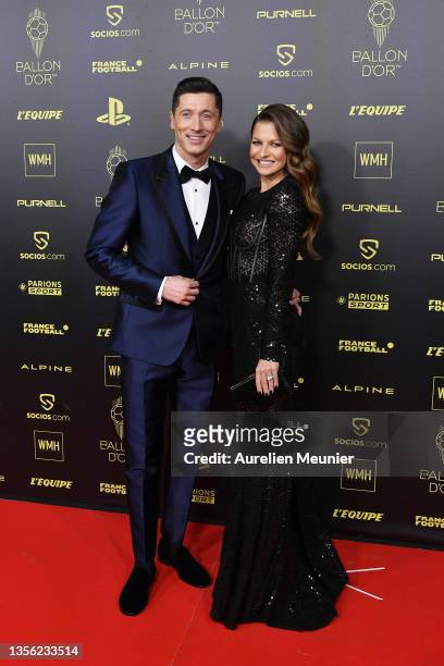 Robert Lewandowski of Poland and Bayern Munich and his wife Anna Lewandowska attend the Ballon D'Or photocall at Theatre du Chatelet on November 29,...
