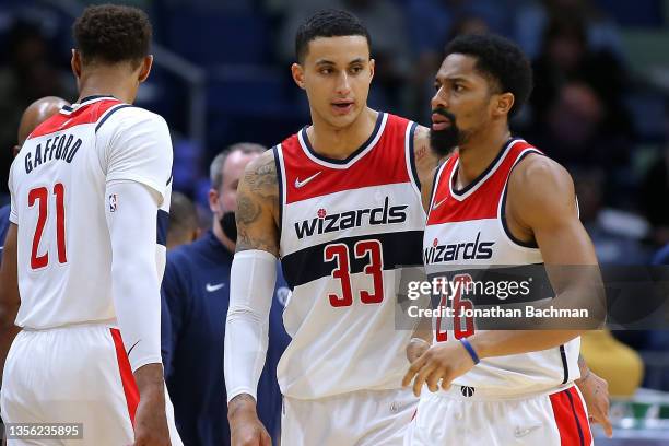 Kyle Kuzma of the Washington Wizards talks to Spencer Dinwiddie during the second half of a game against the New Orleans Pelicans at the Smoothie...