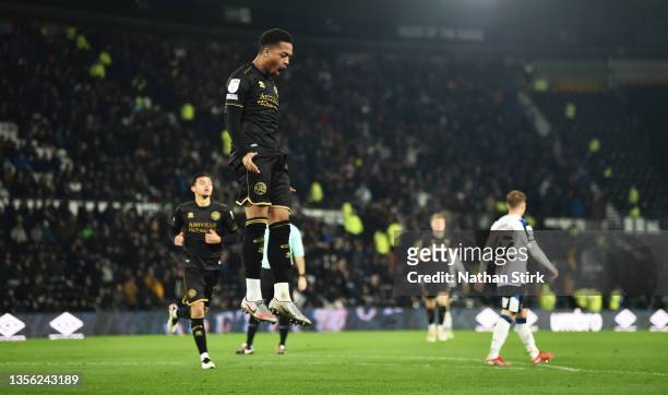 Chris Willock of Queens Park Rangers celebrates after he scores their first goal during the Sky Bet Championship match between Derby County and...