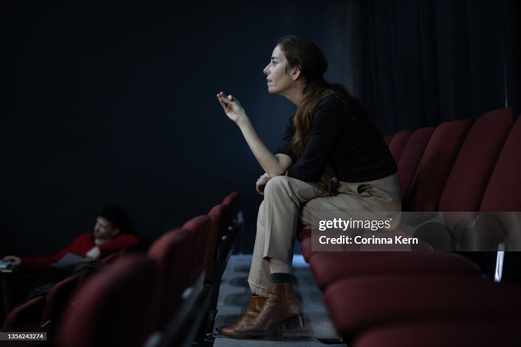 Woman directing theatre play