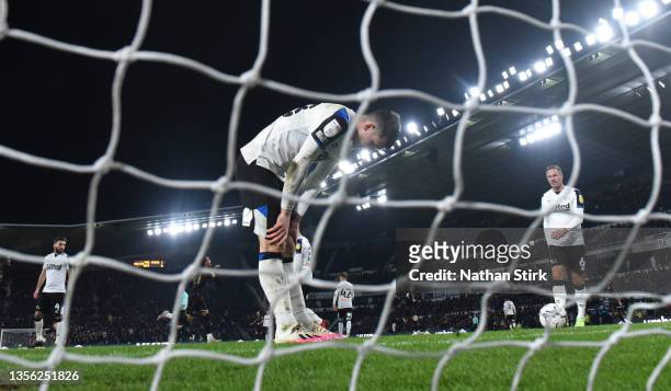 Jason Knight of Derby County reacts after they concede a second goal during the Sky Bet Championship match between Derby County and Queens Park...
