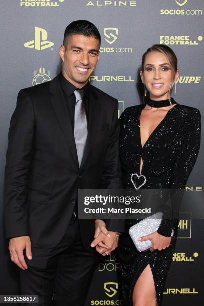 Atletico Madrid's Uruguayan forward Luis Suarez and wife Sofia Balbi attend the Ballon D'Or photocall at Theatre du Chatelet on November 29, 2021 in...