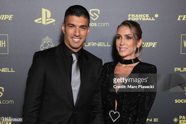 Atletico Madrid's Uruguayan forward Luis Suarez and wife Sofia Balbi attend the Ballon D'Or photocall at Theatre du Chatelet on November 29, 2021 in...
