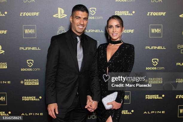 Atletico Madrid's Uruguayan forward Luis Suarez and wife Sofia Balbi attend the Ballon D'Or photocall at Theatre du Chatelet on November 29, 2021 in...