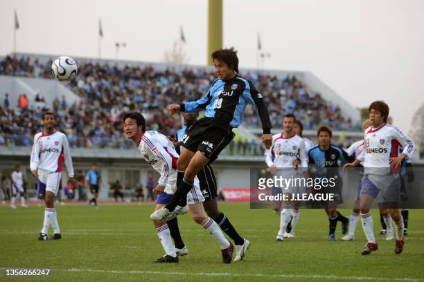 Hiroyuki Taniguchi of Kawasaki Frontale heads to score his side's first goal during the J.League J1 match between Kawasaki Frontale and FC Tokyo at...