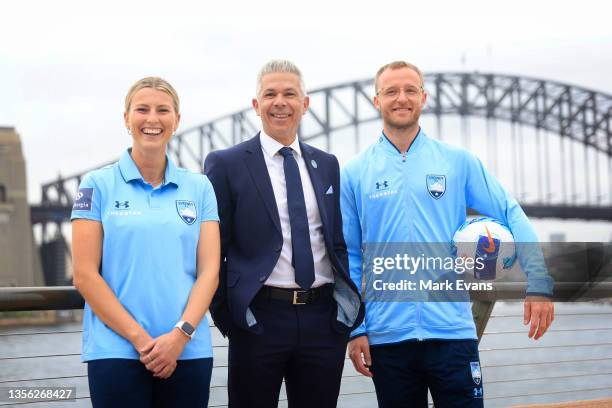 Steve Corica, coach of Sydney FC, poses with players Ally Green and Rhyan Grant during a Sydney FC A-League media opportunity at Sydney Opera House...