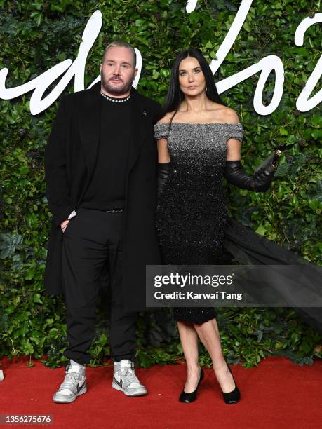 Kim Jones and Demi Moore attend The Fashion Awards 2021 at the Royal Albert Hall on November 29, 2021 in London, England.