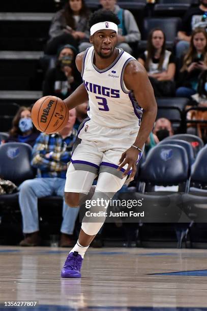 Terence Davis of the Sacramento Kings brings the ball up court during the game against the Memphis Grizzlies at FedExForum on November 28, 2021 in...