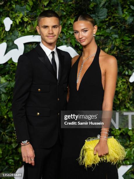 Romeo Beckham and Mia Regan attend The Fashion Awards 2021 at the Royal Albert Hall on November 29, 2021 in London, England.